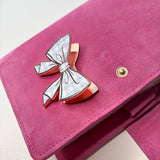 JOURNAL CLIP | CHECKERED BOW | APRIL 2026