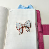 JOURNAL CLIP | CHECKERED BOW | APRIL 2026